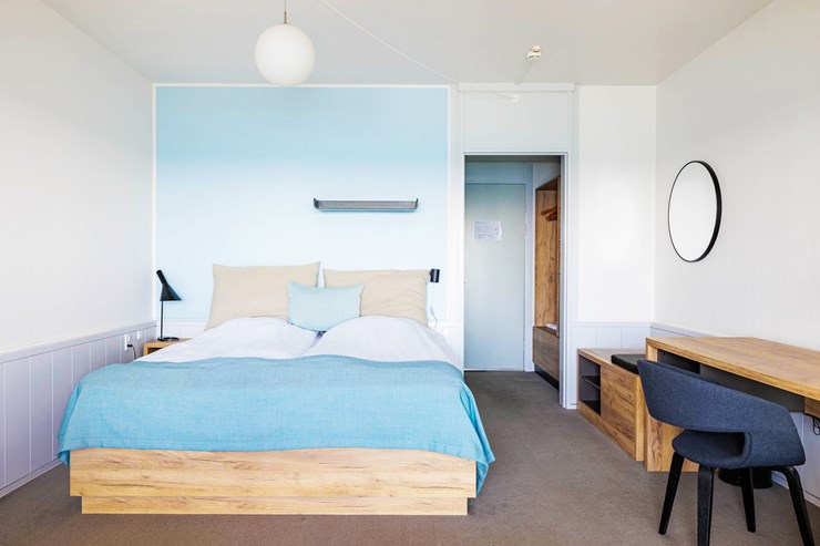 Indretning af værelserne med havudsigt