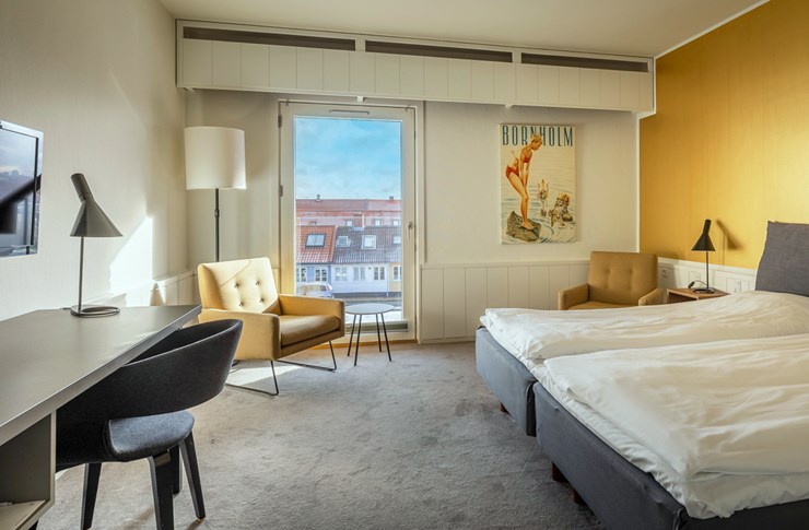 Værelse med byudsigt og fransk altan